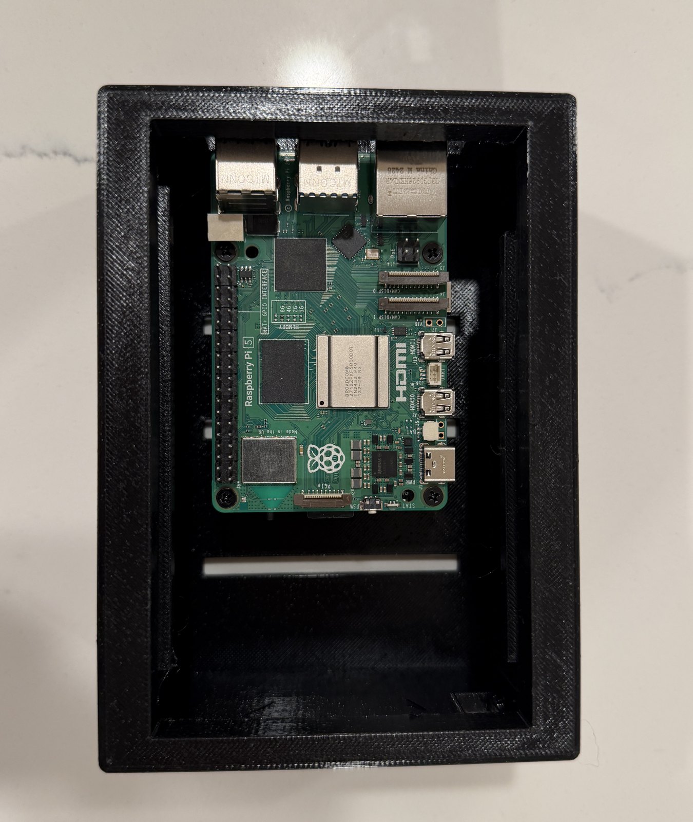 Raspberry Pi 5 inside the 3D-printed case